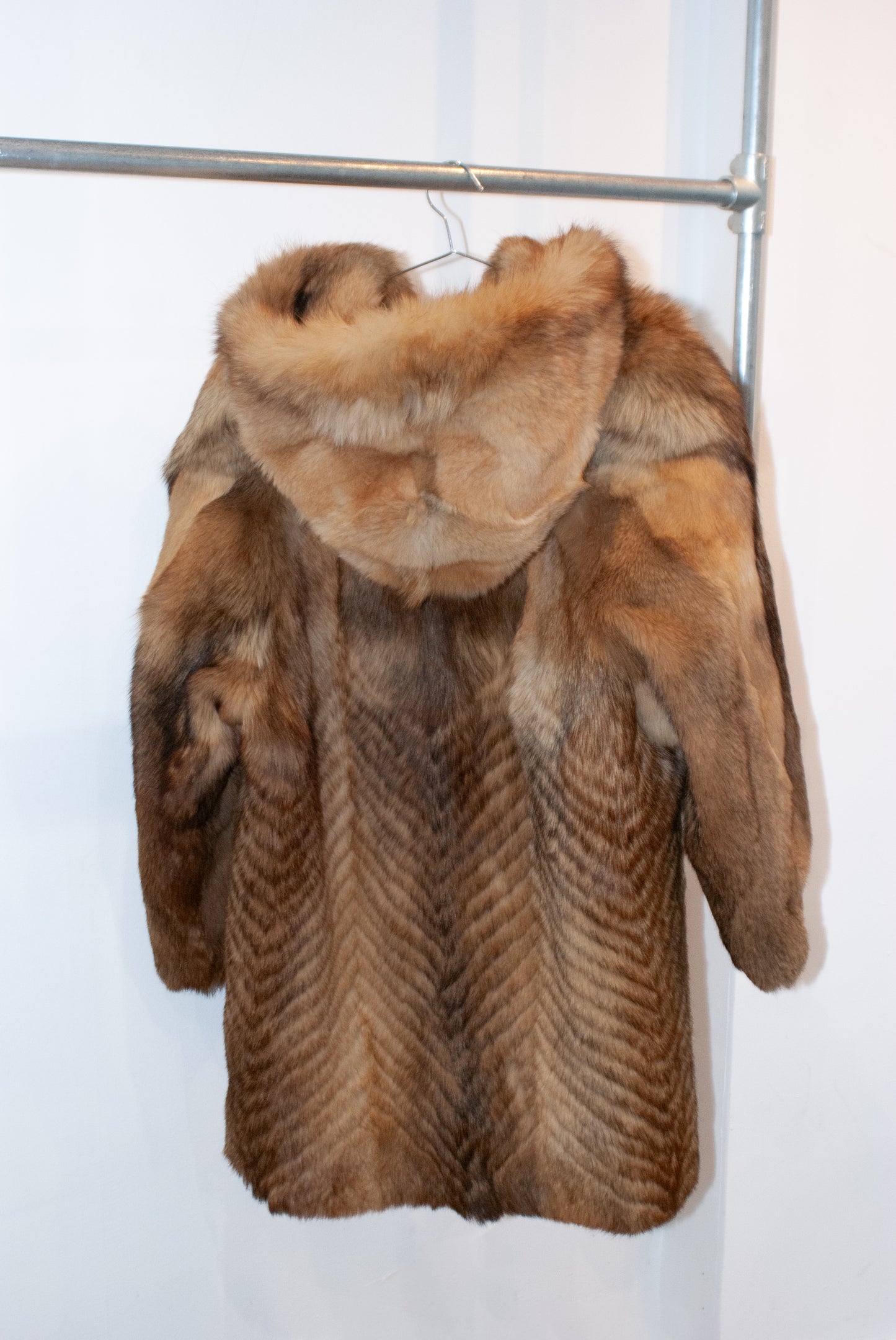 Hooded fur coat