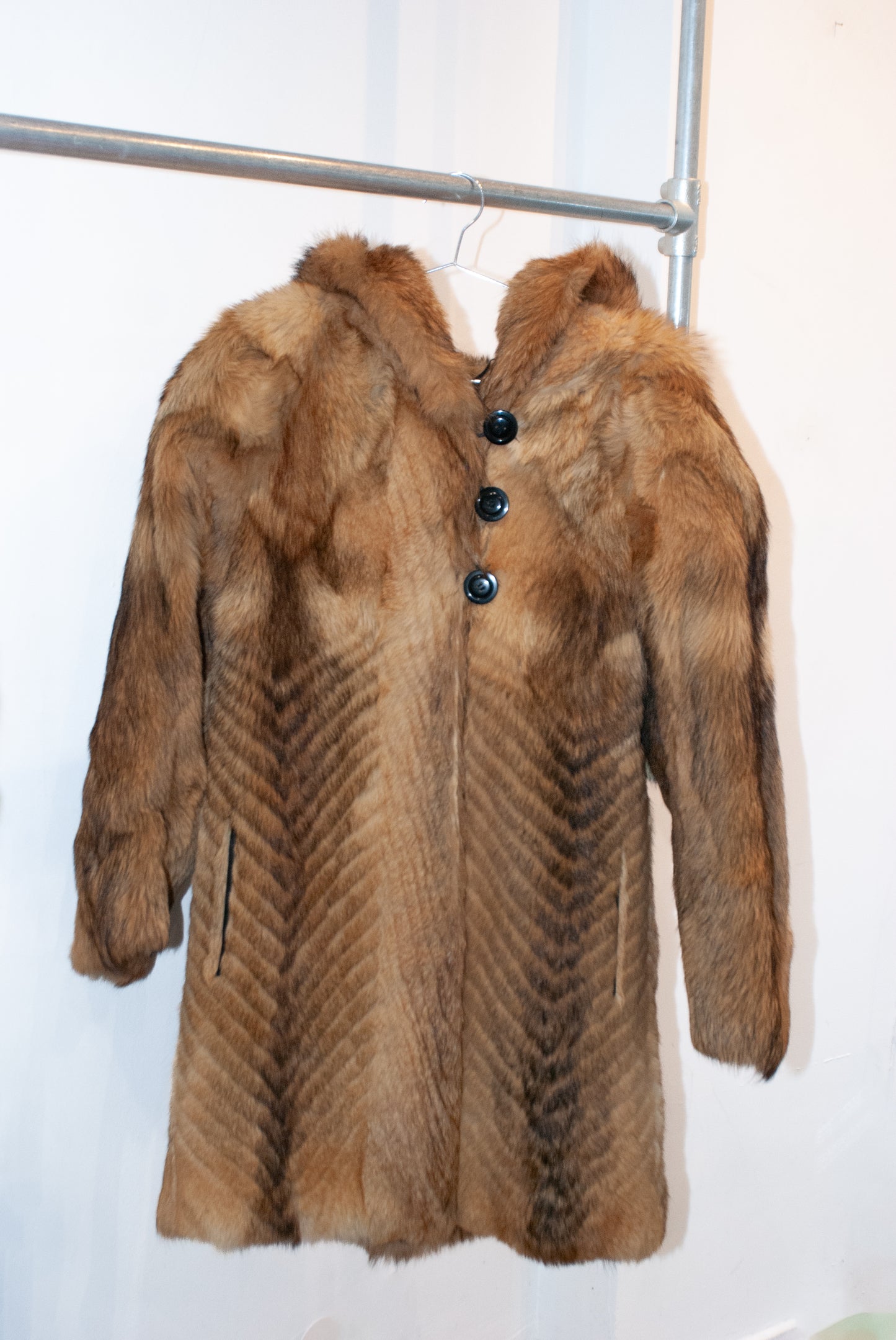 Hooded fur coat
