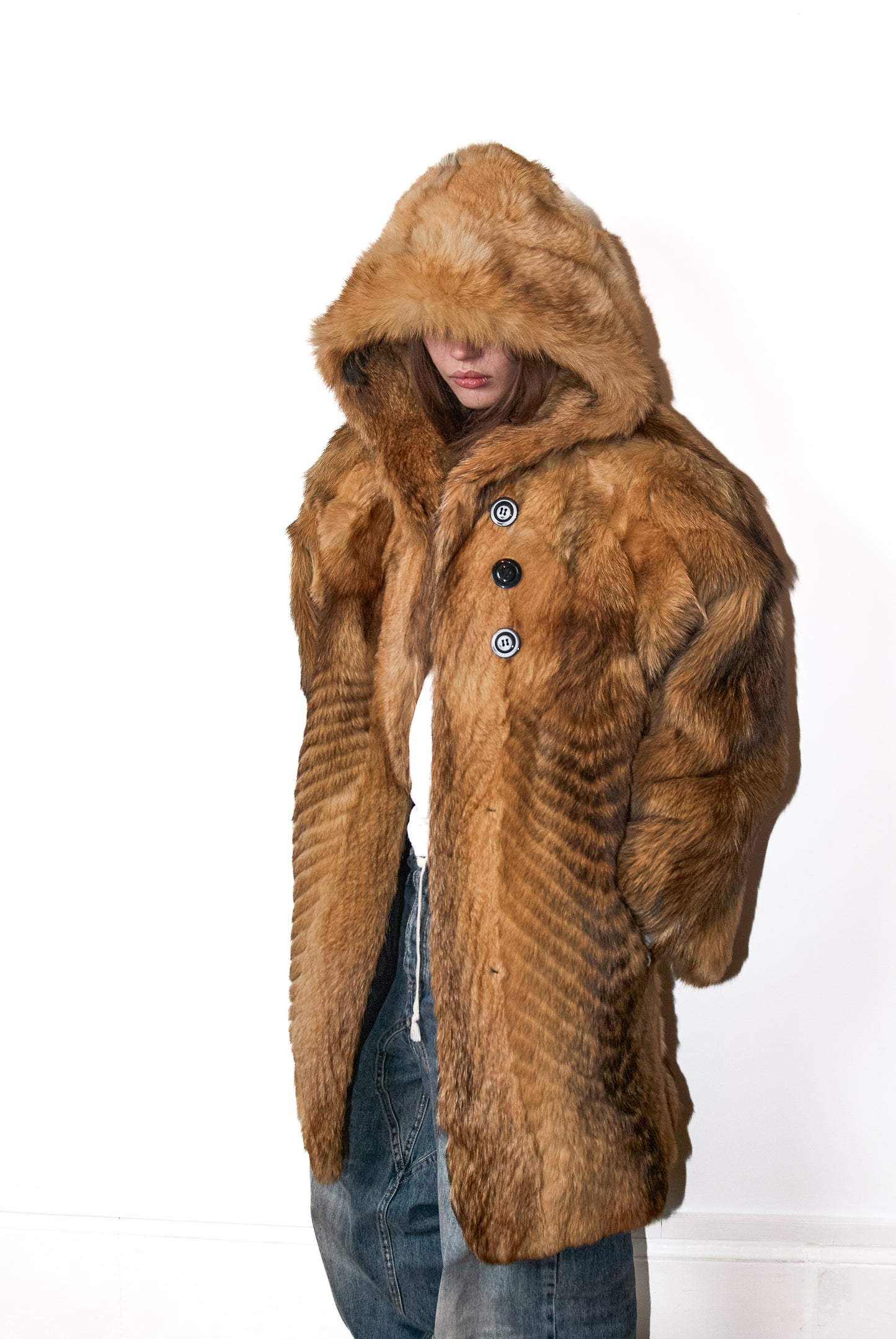 Hooded fur coat